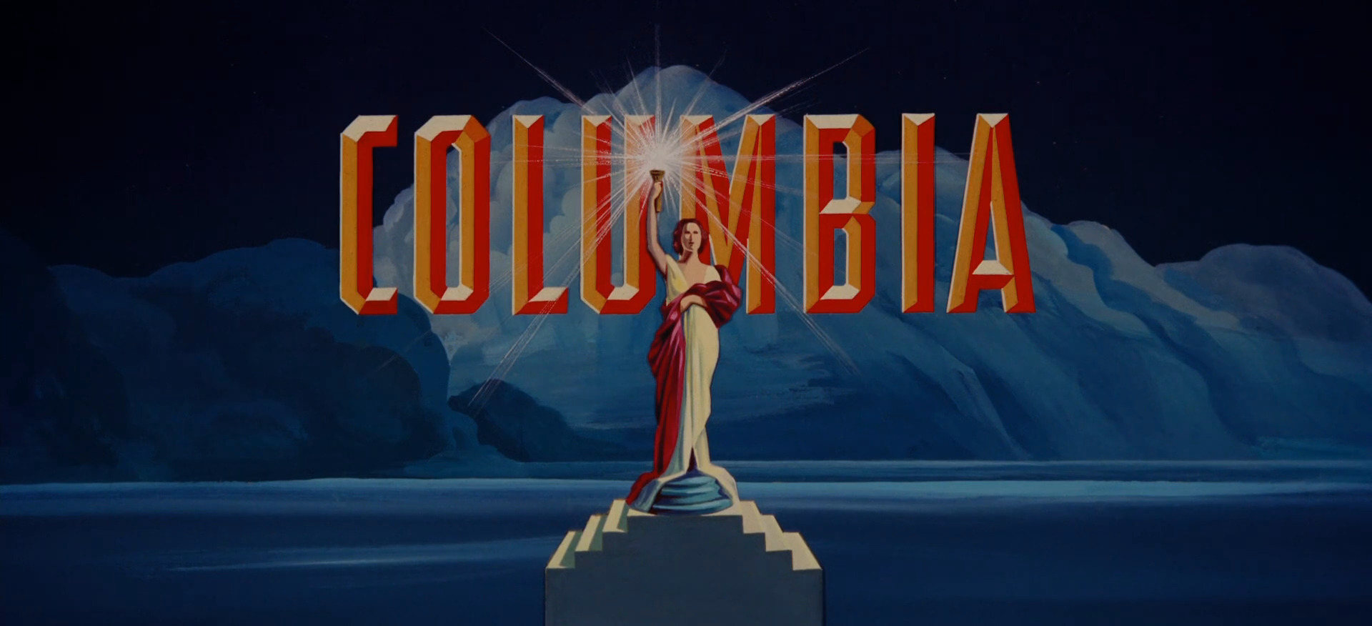 Description: A woman holding a torch as part of the Columbia Tristar Motion  Picture Group logo.. Original Film Title: FILM HISTORY: COLUMBIA STUDIOS.  English Title: FILM HISTORY: COLUMBIA STUDIOS Stock Photo 